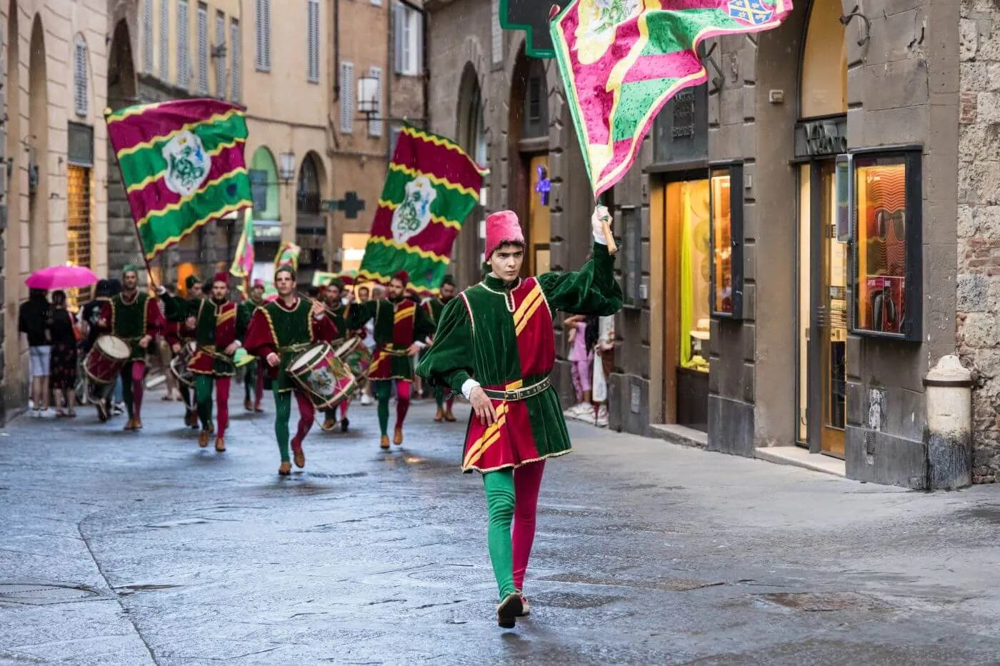 Flag-wavers in a street of the old town