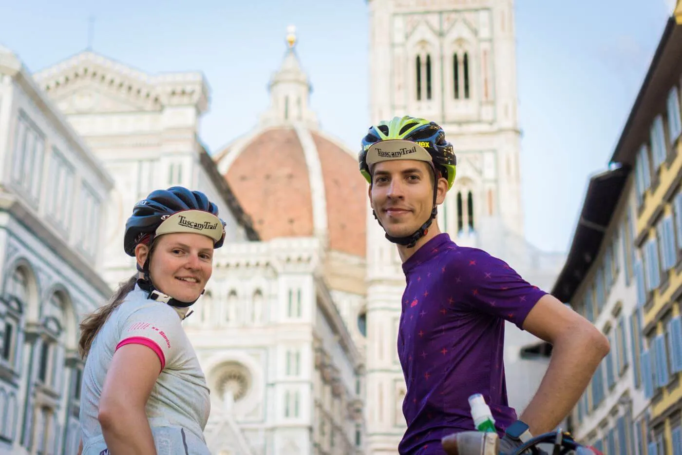 Two riders in front of Florence Cathedral